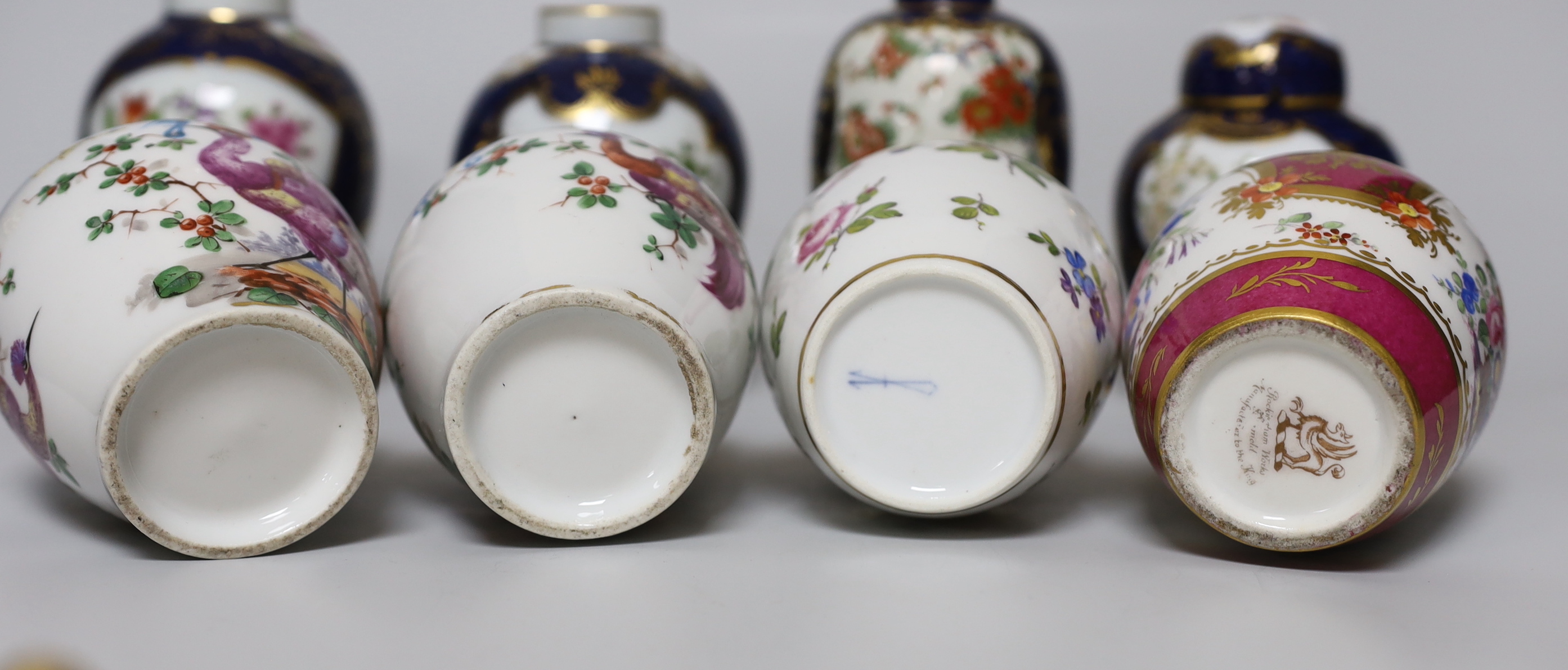 A group of Paris porcelain tea canisters in imitation of Worcester and Sevres, tallest 13.5cm, together with a Worcester Kakiemon pattern scale blue tea canister a/f
